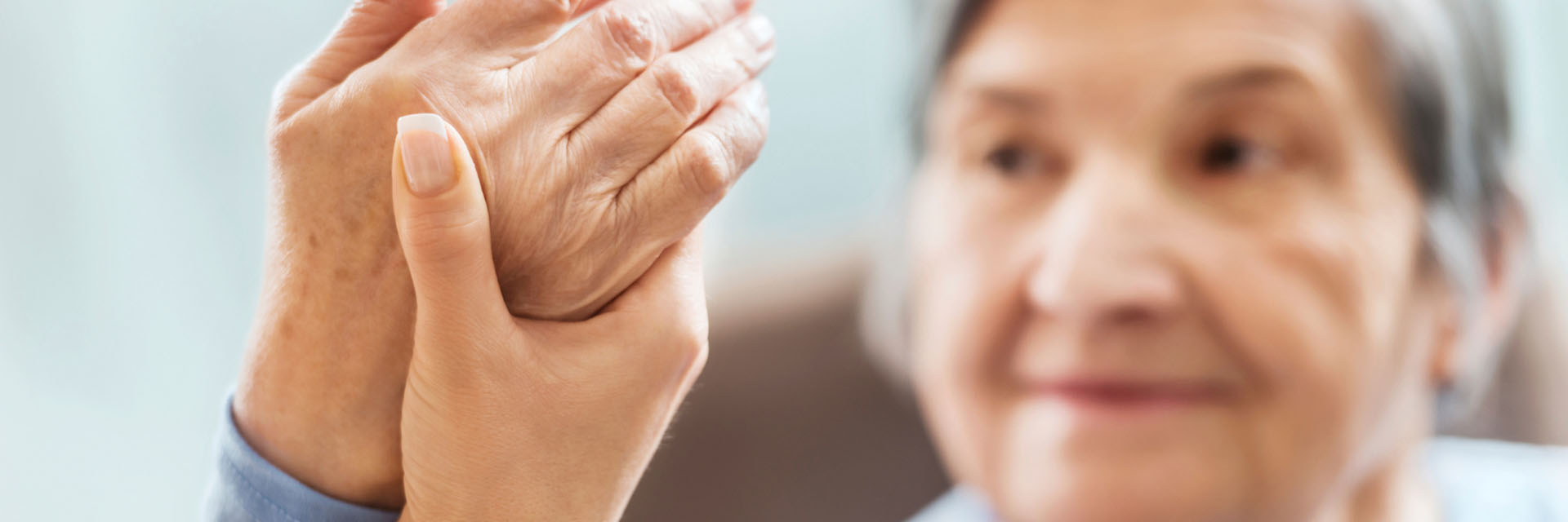 Woman Receiving Physical Therapy At Home